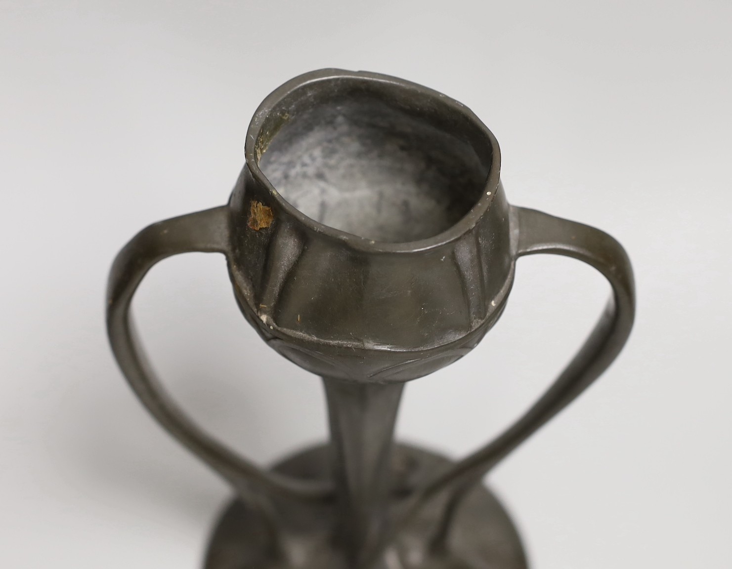 A Liberty & Co. Tudric pewter posy vase, designed by Archibald Knox, 25cms high